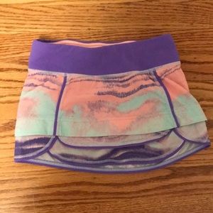 Ivivva pink, purple, and blue tennis skirt